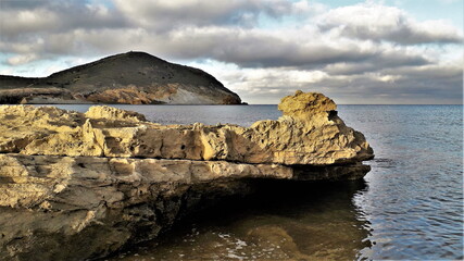 Sunset on the Genoveses beach, where fossil dunes coexist with living dunes, the sun illuminates...