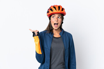 Young cyclist brazilian girl isolated on white  background intending to realizes the solution while lifting a finger up