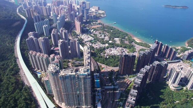 Wonderful skyline of high skyscrapers and downtown district in Ma On Sha Hongkong. Wide drone shot in a claim Autumn day