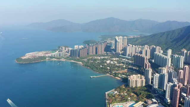 Wonderful skyline of high skyscrapers and downtown district in Ma On Sha Hongkong. Wide drone shot in a claim Autumn day