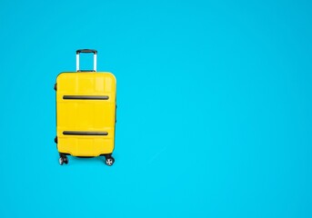 Colorful travel bag on blue background