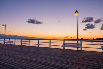 Molo pier on the Baltic Sea in Jastarnia at sunset, Poland.
