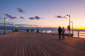 Molo pier on the Baltic Sea in Jastarnia at sunset, Poland.
