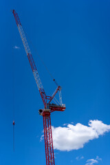 industrial crane against the blue sky