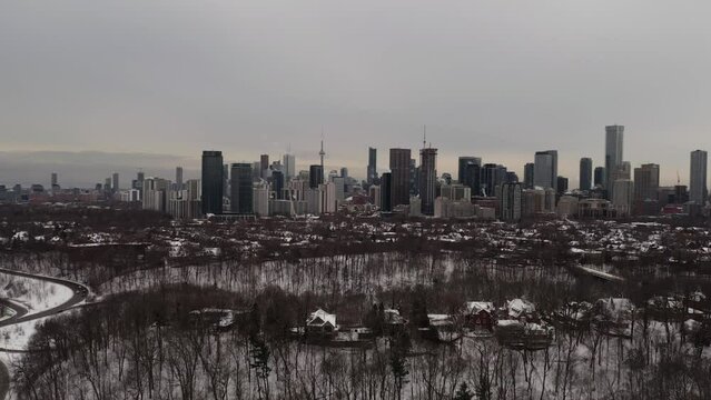 Rise Up, Push In shot with a drone of the Toronto skyline from Rosedale. 4K, 29.97 Frames