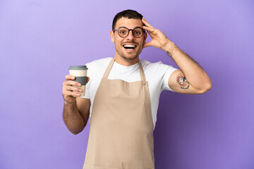 Brazilian restaurant waiter over isolated purple background with surprise expression