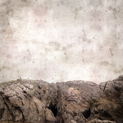 stylish textured old paper square background with landscape of coastal part of Cantabria called Costa Quebrada, the Broken coast

