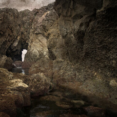 stylish textured old paper square background with landscape of coastal part of Cantabria called Costa Quebrada, the Broken coast
