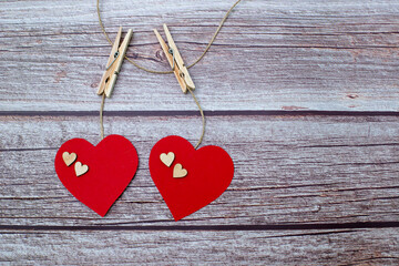 Valentines's day. Two red heart on wooden background. Copy space. Space for text.