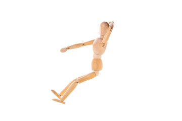 a wooden man sits with his hand behind his head isolated on a white background