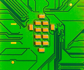 Close up of microchips and pins on Main CPU PC processor circuit board..