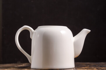 White empty porcelain teapot.