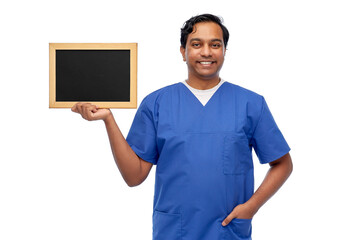 healthcare, profession and medicine concept - happy smiling indian male doctor or nurse in blue...