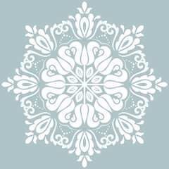 Oriental pattern with arabesques and floral elements. Traditional classic round white ornament. Vintage pattern with arabesques