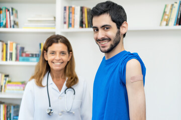 Laughing arabic man after third vaccination against Covid 19