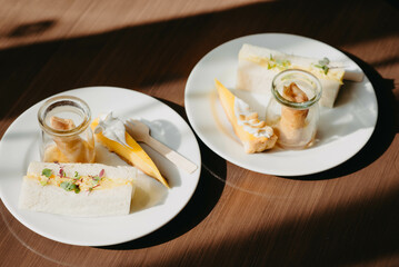 cheesecake and sandwiches and spring rolls 