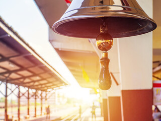 The bell rang, signaling a train coming into the station.
