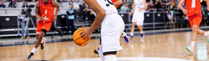 basketball game focus on ball