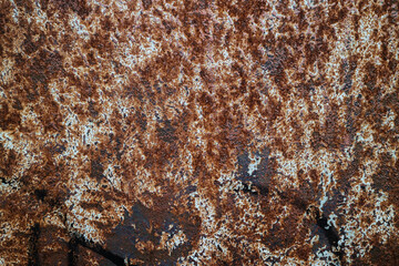 Old grunge rusty metal texture with scratches and crack. Vintage dark rustic metal background.