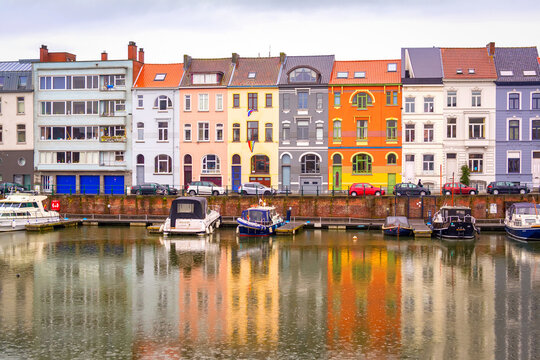 Houses and boats along the Leie river, ghent, belgium 