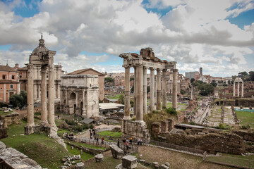 View from the Capitol to the Imperial Forums, the ruins of the Basilica of Julius and the temple of Saturn and the arch of Septimius Severus. Rome, Italy