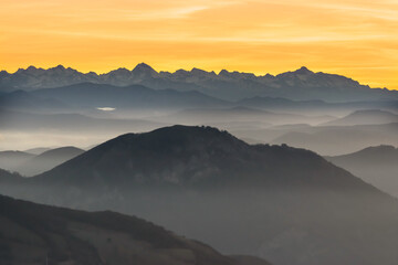 Silhouettes of the Navarrese mountains at dawn. Pyrenees in the background