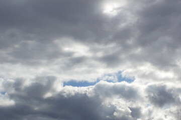 cumulus clouds in a blue sky a dramatic scene before the rain