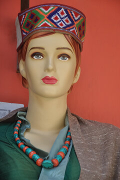 Closeup of a female mannequin in himachali traditional (North indian) dress and himachali topi
