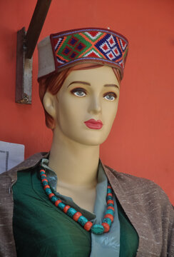 Closeup of a female mannequin in himachali traditional (North indian) dress and himachali topi