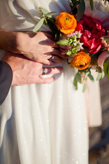 Love couple with rings and bouquet