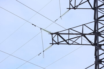 Wires and insulators on a high voltage power line tower