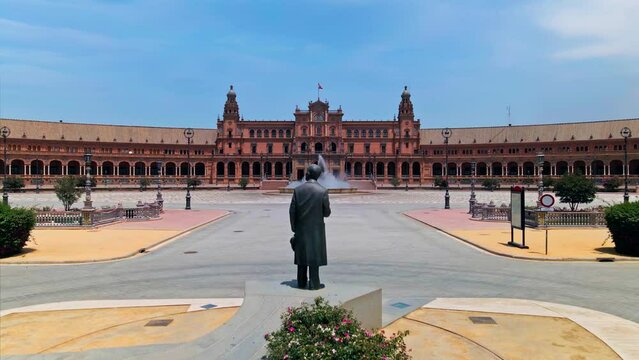 Empty Plaza de Espa&ntilde;a (Spain Square) in the Parque de Mar&iacute;a Luisa. Drone jib up, Seville, Spain