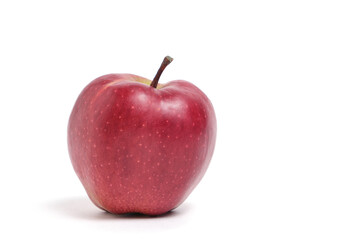Bright red, juicy apple on white background.