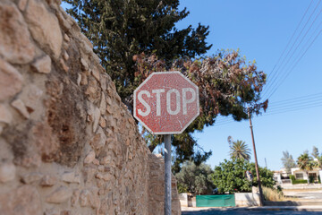 old stop sign on the street of Cyprus
