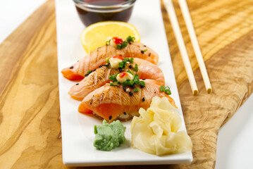 Various sushi rolls on white background. With copy space for text. Top view. Japanese food restaurant sushi maki roll plate. delicious seafood sushi at a Japanese restaurant