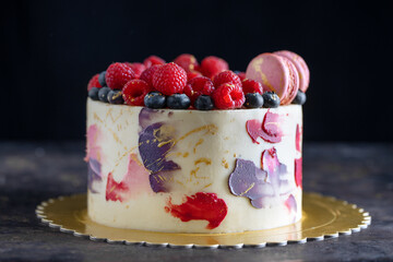 Tasty modern cake with fruits and berries