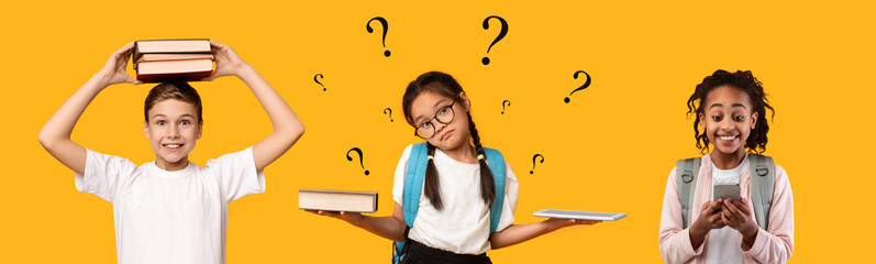 Asian girl standing with book and tablet in studio