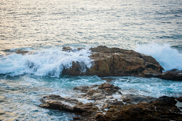 Ocean waves against rocks