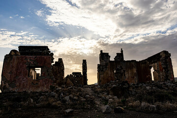 ruined castle in the canary islands in ruins with beautiful colors ruins of a bygone era of the canary islands with red colors known as the tojo de jinamar castle with ancient architecture