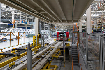 Automobile production line. Modern car assembly plant. Interior of a high-tech factory, manufacturing