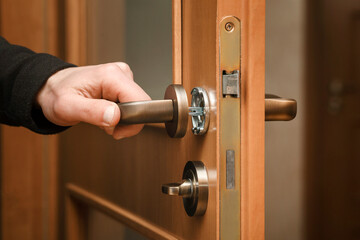 Door Handle Fixing Repairman installs Door Knob Service Handle Door