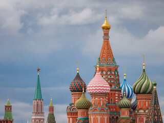 Fototapeta na wymiar travel to moscow, russia, main tourist attractions. Basil's Cathedral on Red Square in Moscow on a cloudy day