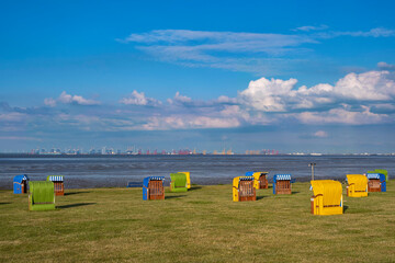 A lawn with beach chairs on the shore of the North Sea near Butjadingen/Germany 