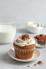 carrot and nuts cupcake with cream cheese frosting