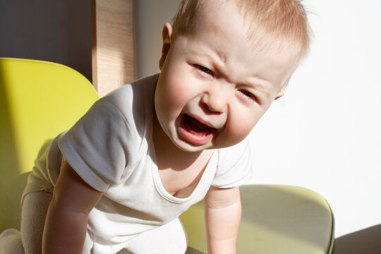 Baby emotional crying or angry. Toddler enraged