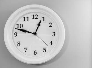 Wall clock on white background. Round shape clock isolated on white. Classical office watch. Deadline illustration. Time concept. Ticking clock.Time measurement.