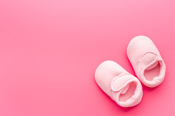 Baby girl pink newborn booties - babyshower party background