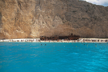 Amazing landscape of Navagio beach with shipwreck on Zakynthos island, view from the cruise ship. Greece - 486500451