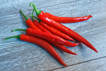  red hot chilli pepper on wooden table