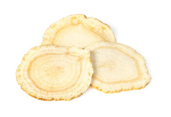 Close up of ginseng slices isolated on white background.